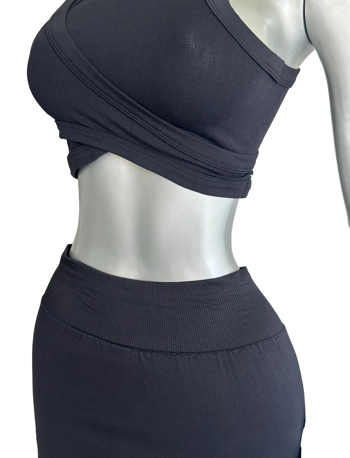 SET CONJUNTO DEPORTIVO TOP SIN MANGAS Y FALDA