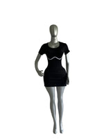 ENTERIZO DEPORTIVO DE MANGA CORTA Y FALDA