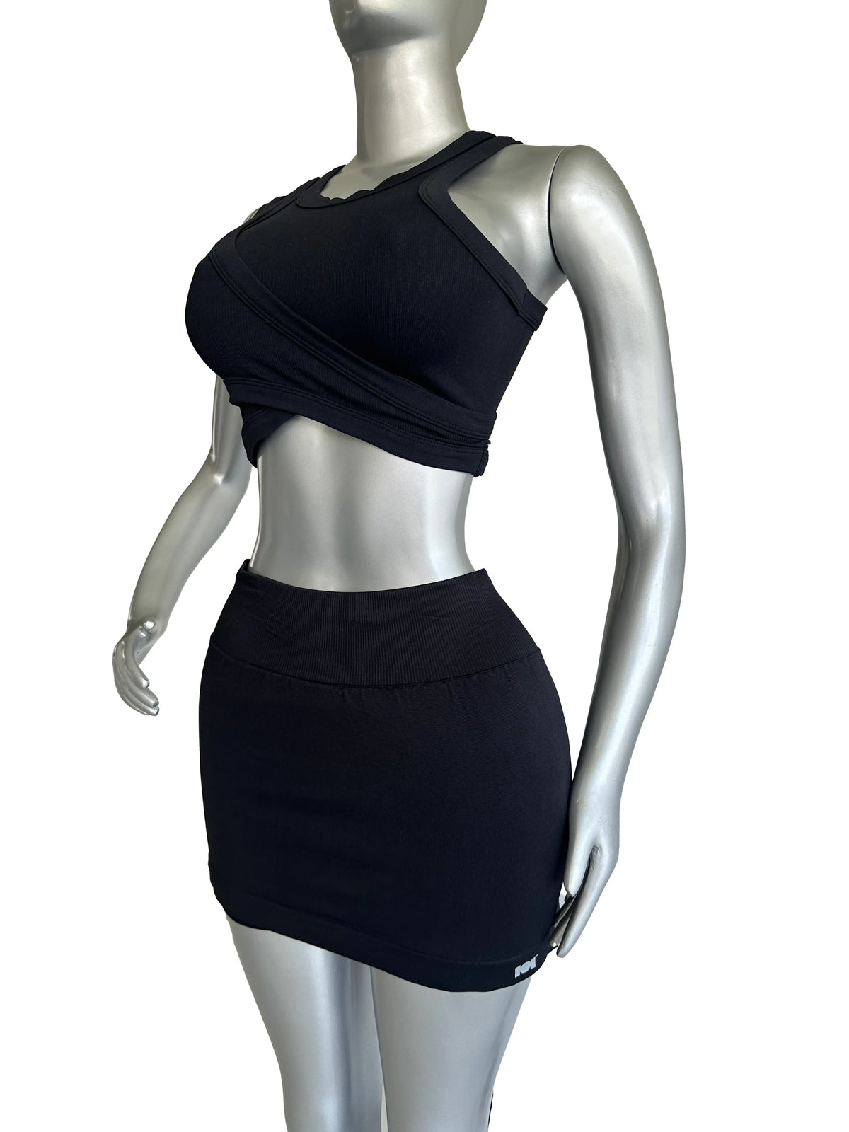 SET CONJUNTO DEPORTIVO TOP SIN MANGAS Y FALDA