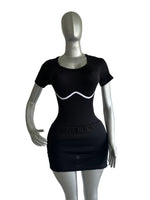 ENTERIZO DEPORTIVO DE MANGA CORTA Y FALDA