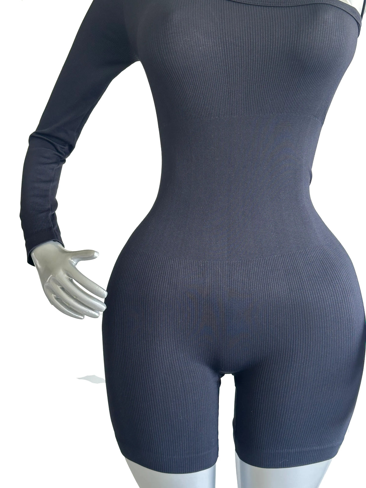 ENTERIZO DEPORTIVO DE SHORT Y UNA MANGA LARGA